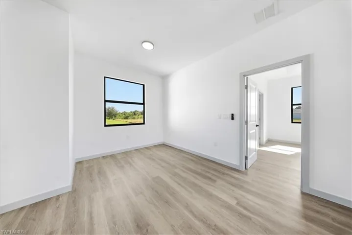 Spare room with light wood-style floors