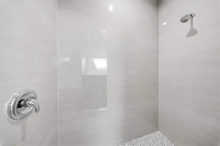 Bathroom with a tile shower