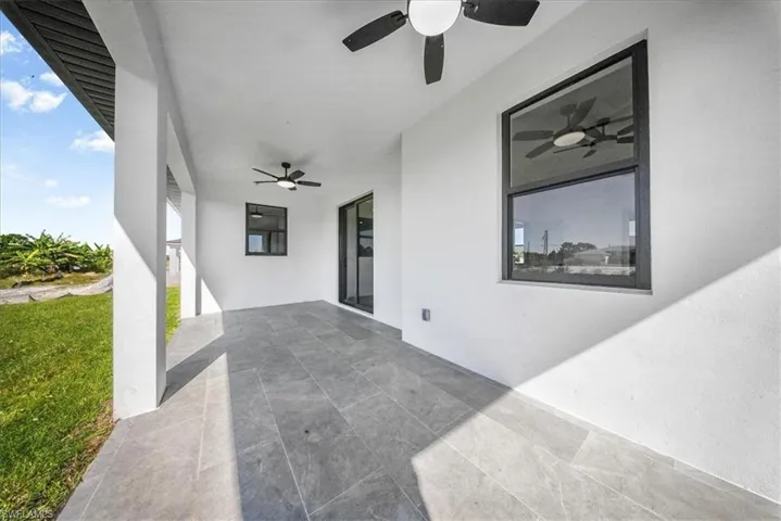 View of patio with a ceiling fan