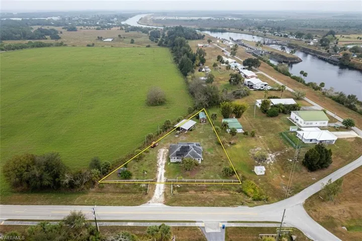 Aerial overview of property's location with property parcel outlined