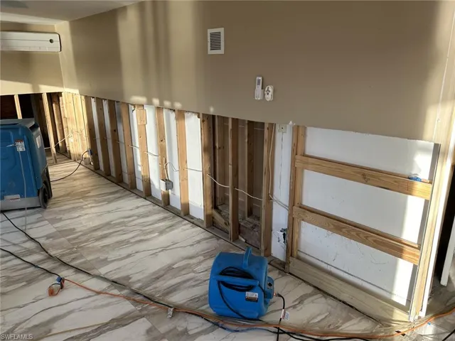 View of cut out drywall in Master room.
