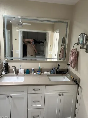 Prior to Milton.  Master bathroom with vanity and mirror.
