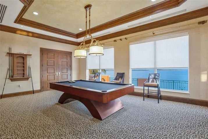 Belize Social Room includes pool table, bar, card room, and sitting areas