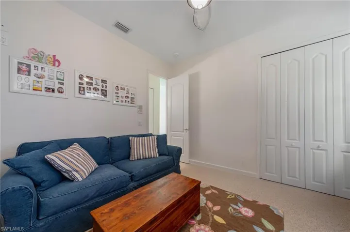 Living room featuring carpet flooring