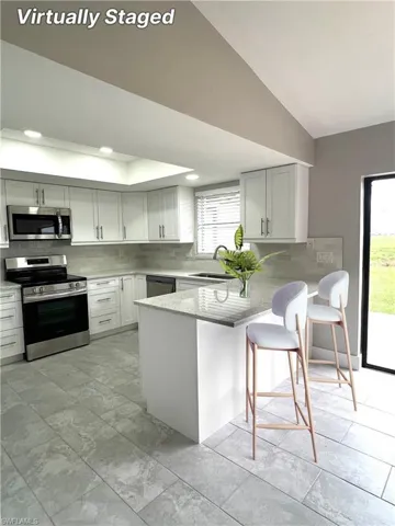 834 Gardenside Ct - Breakfast Bar Virtually Staged