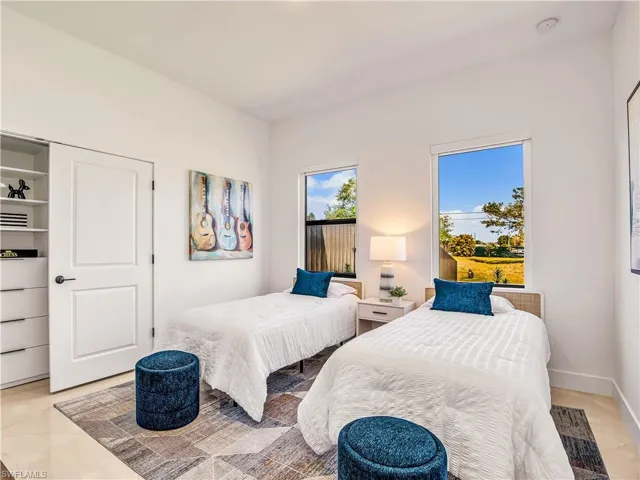 Bedroom featuring baseboards