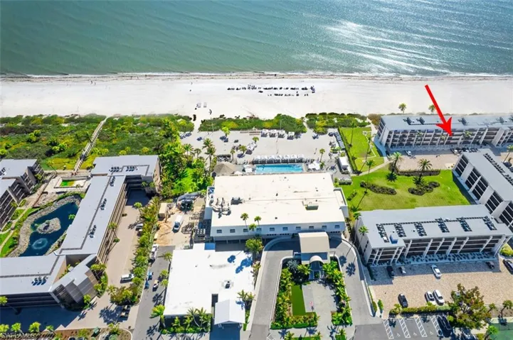 Drone / aerial view of waterfront with a beach
