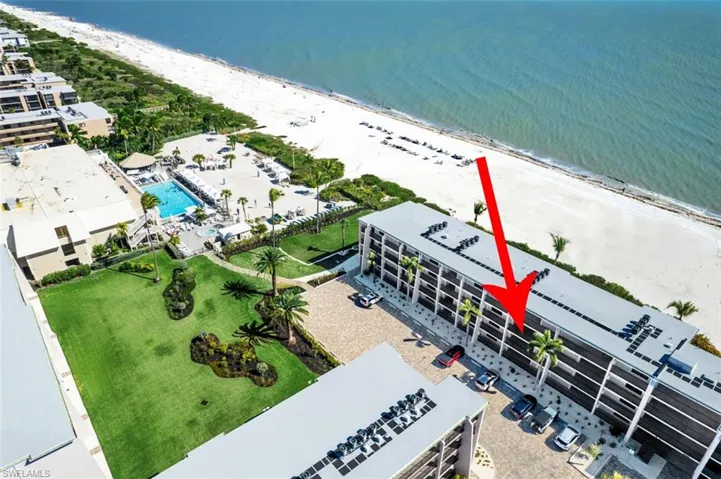 Aerial view of a pool and expansive coastline