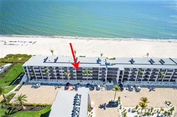 Aerial view of Building K along the expansive coastline