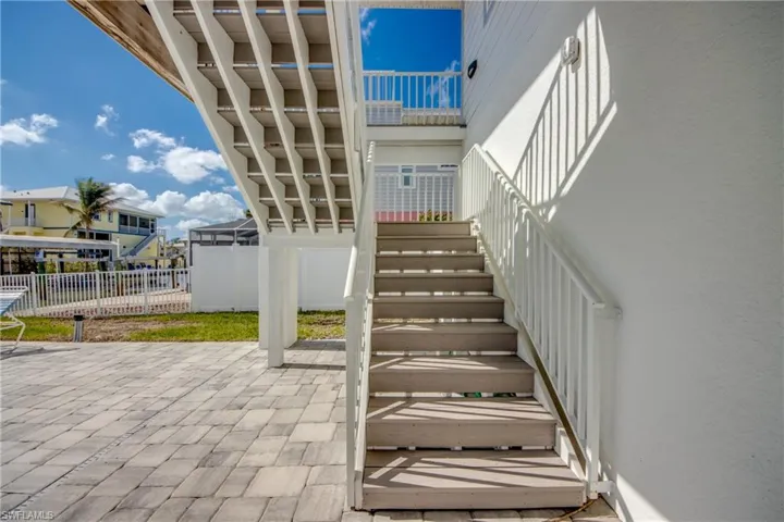 View of patio / terrace featuring glass enclosure