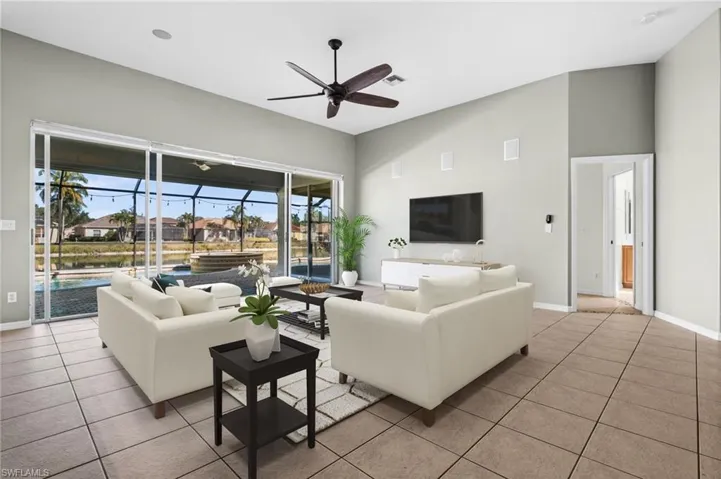 Photo includes virtual staging to showcase the possibility of the living room.
