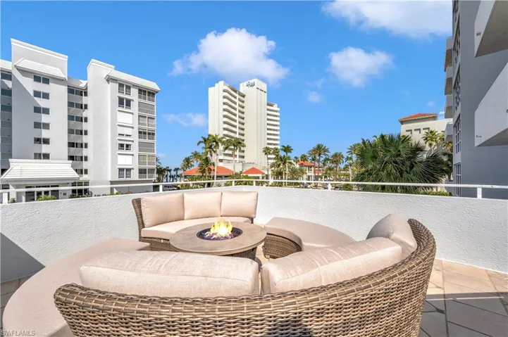Balcony featuring a fire pit
