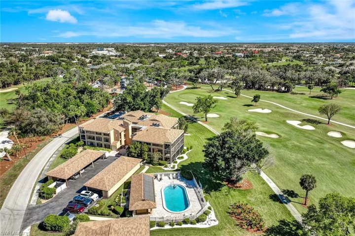 Aerial View of the Pool, Shade & Grills as Well