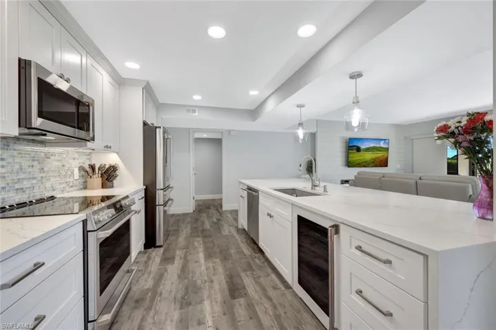 Work of Art Kitchen, Who Spends $2000 on a Wine Cooler? They Did- It's ALL Perfection here...