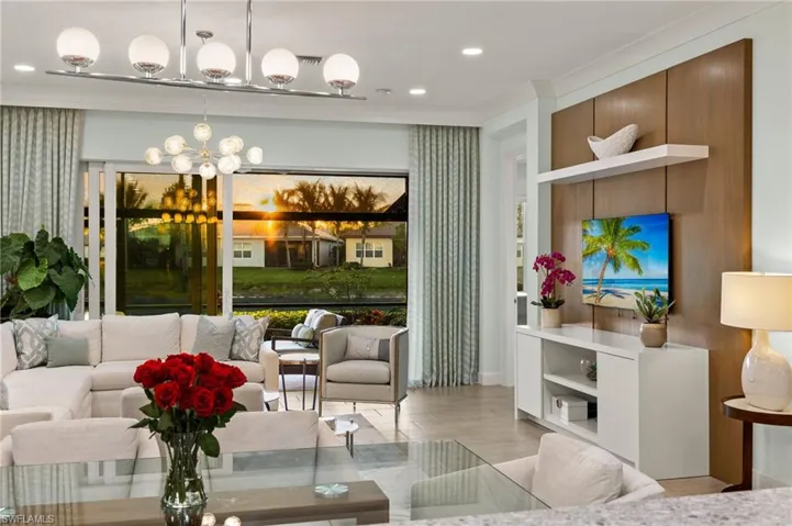 Living room featuring a chandelier and recessed lighting