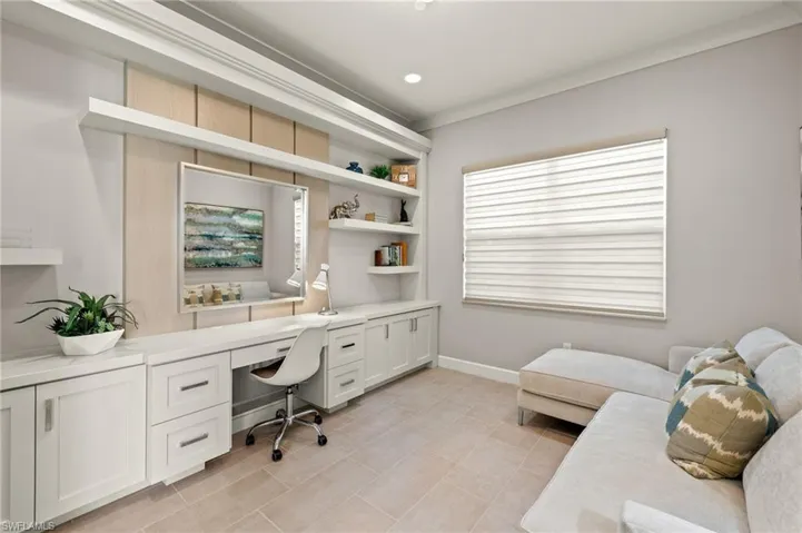 Office featuring recessed lighting, built in study area, and baseboards