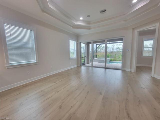 great room with coffered ceiling