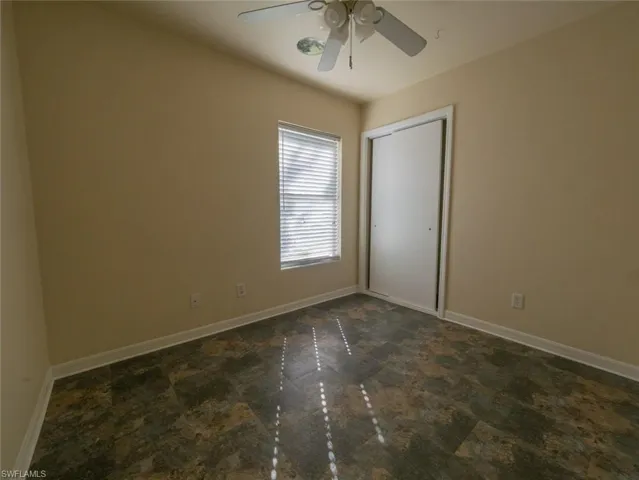 Spare room featuring ceiling fan