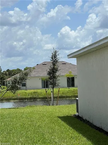 View of yard featuring a water view