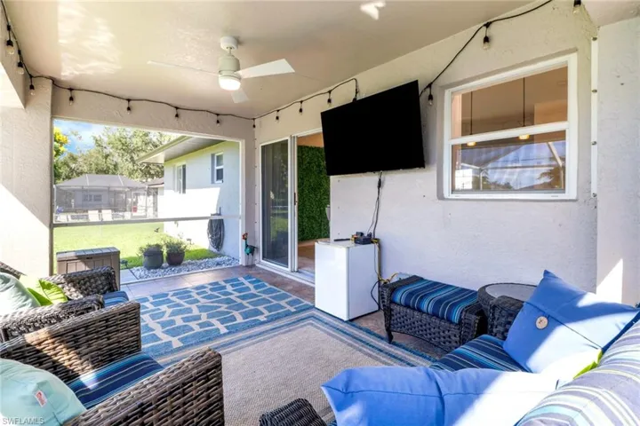 View of patio featuring ceiling fan and an outdoor hangout area