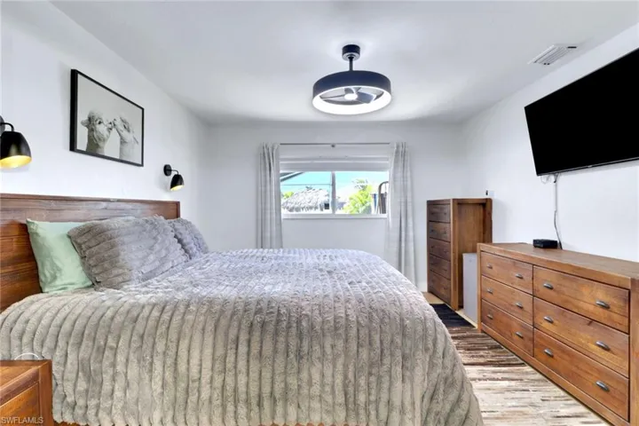 Bedroom featuring wood finished floors