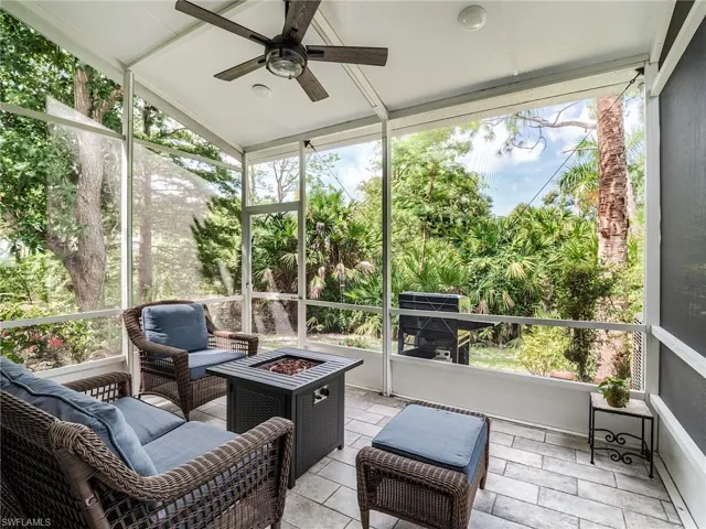 Sunroom / solarium with ceiling fan and plenty of natural light