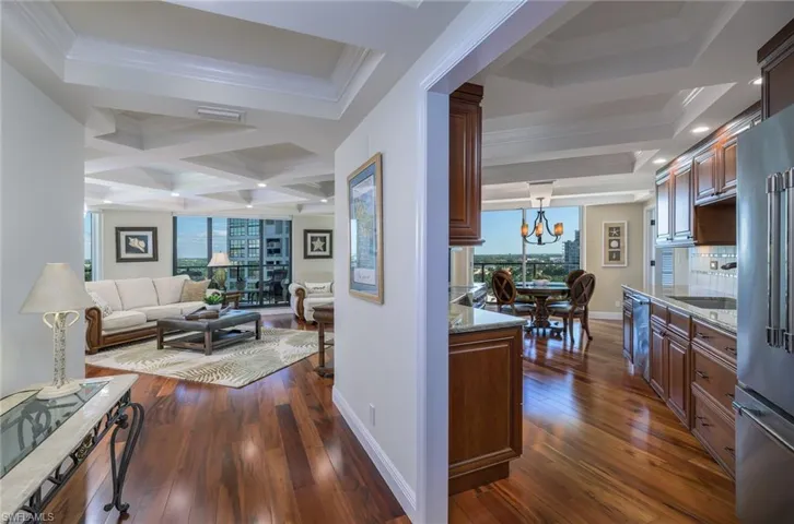 Foyer looking to kitchen and living room