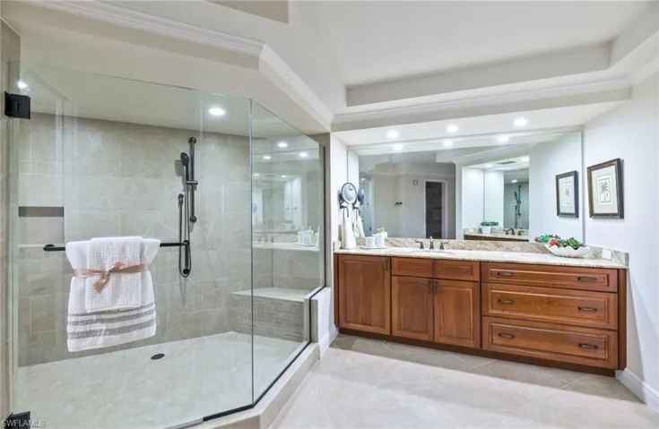 Double vanities, shower and water closet