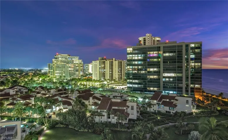 City lights at dusk from balcony