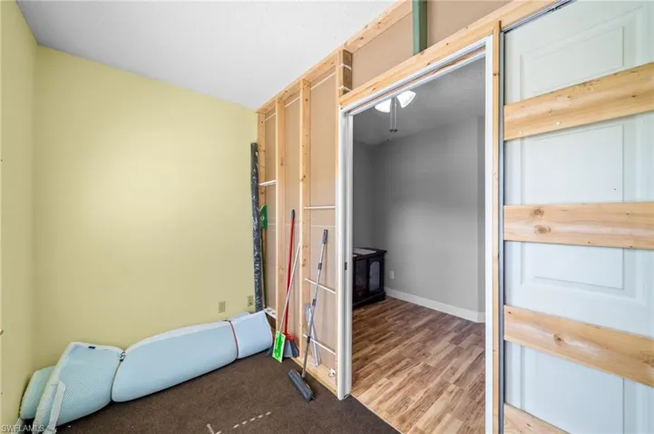 Unfurnished bedroom featuring wood finished floors