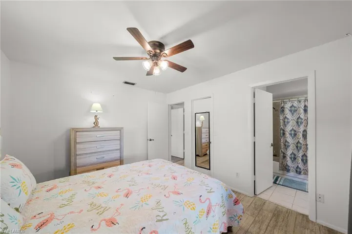 Bedroom featuring a ceiling fan and light wood-style floors