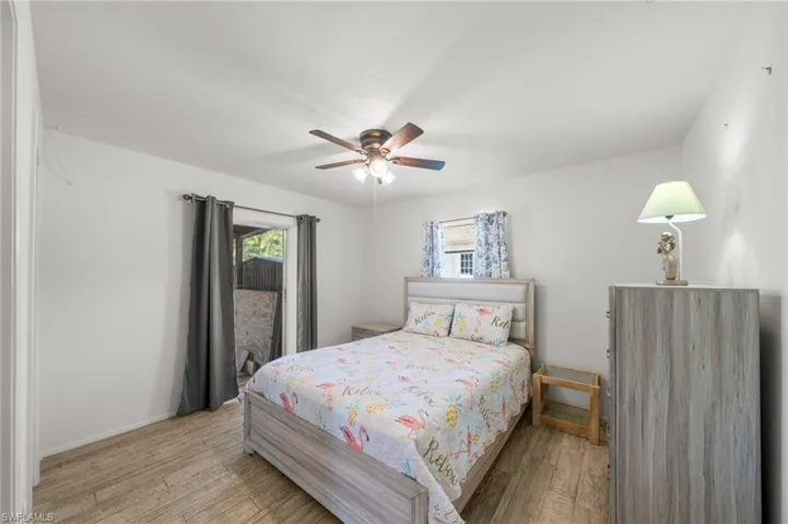 Bedroom featuring light wood-type flooring and ceiling fan