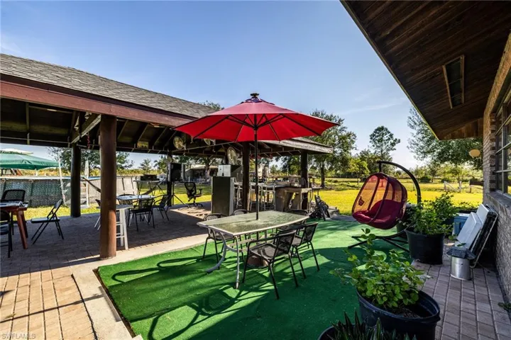 View of patio featuring a gazebo