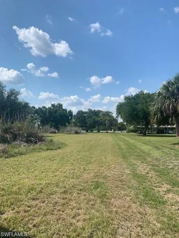 View of yard with a rural view