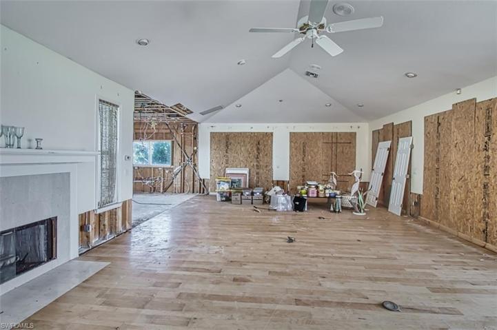 Current Vaulted Living Room with Fireplace