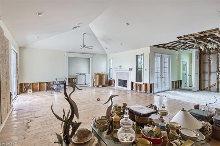 Current Vaulted Living Room and Fireplace