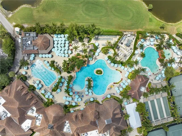 Aerial view of property's location with a pool