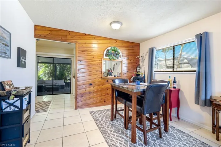 Unit #2 Dining area with passthrough to kitchen