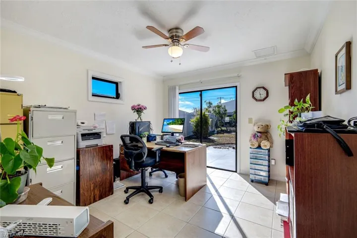 Unit #1 Guest bedroom #1 used as office space with slider to back yard