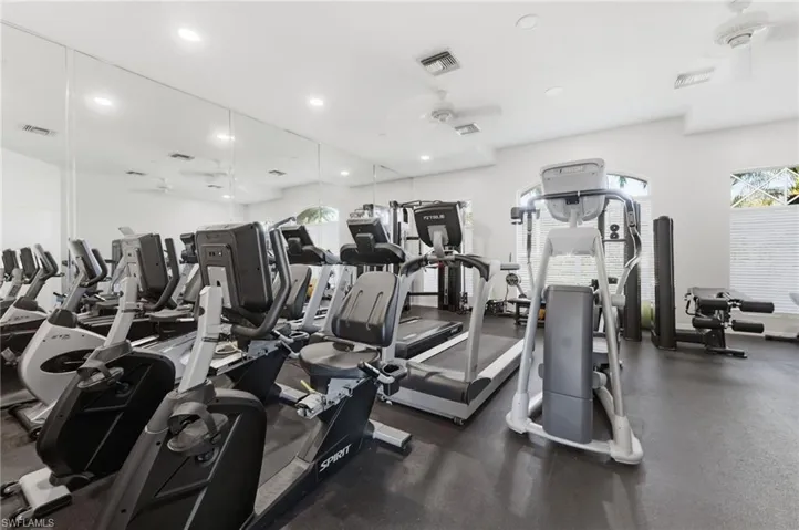 Amenities:Exercise room featuring ceiling fan
