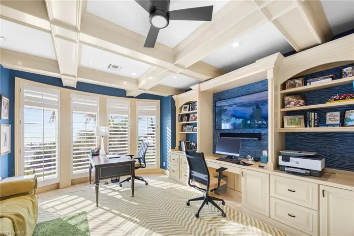 Office with built in desk, and space for a second desk , lovely coffered ceiling, built-in shelving and Gulf views!