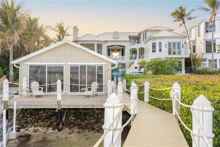 Looking back at the house and its super cute boathouse-cottage