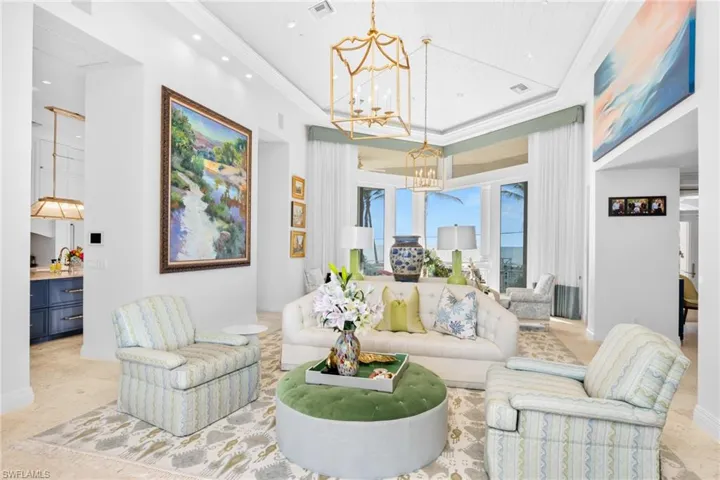 Living room with soaring ceilings, custom artwork and incredible views