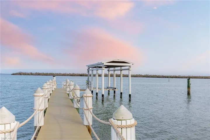 Dock with covered boat lift also has a floating kayak dock (not pictured)