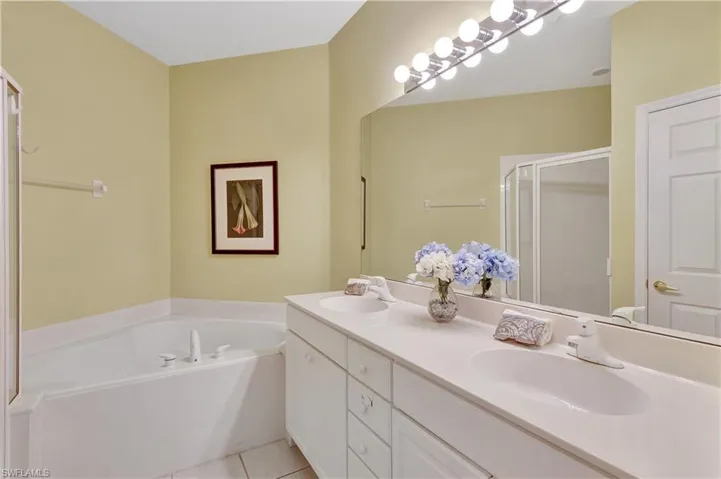 Bathroom with a  goo size stall shower