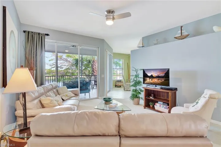 View of the lanai and lake, tastefully decorated