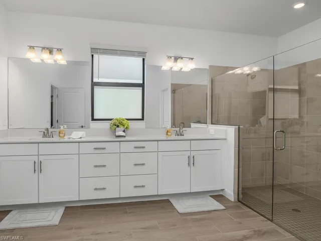 Owner suite with entry to HUGE walk-through closet, giving you easy access to the laundry room.