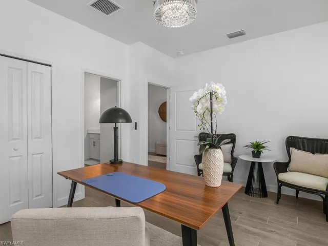Office and/or Bedroom at front of home provides lots of natural light and included ensuite "jack and jill" bath.