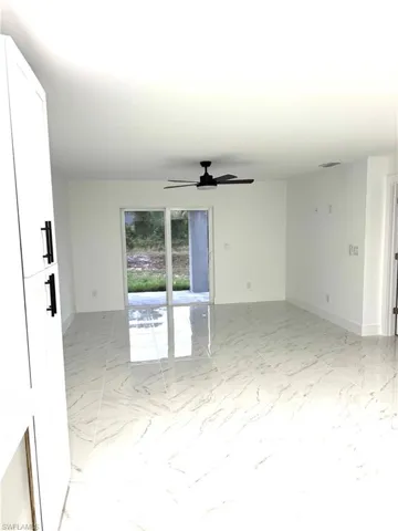 Unfurnished room with ceiling fan