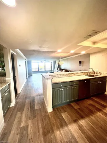 View from kitchen into dining, living